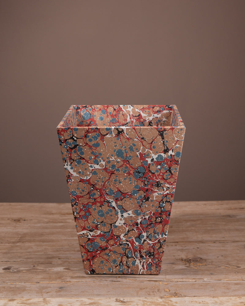 Wastepaper bin covered with marbled paper, office bin