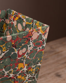 Office bin covered in marbled paper
