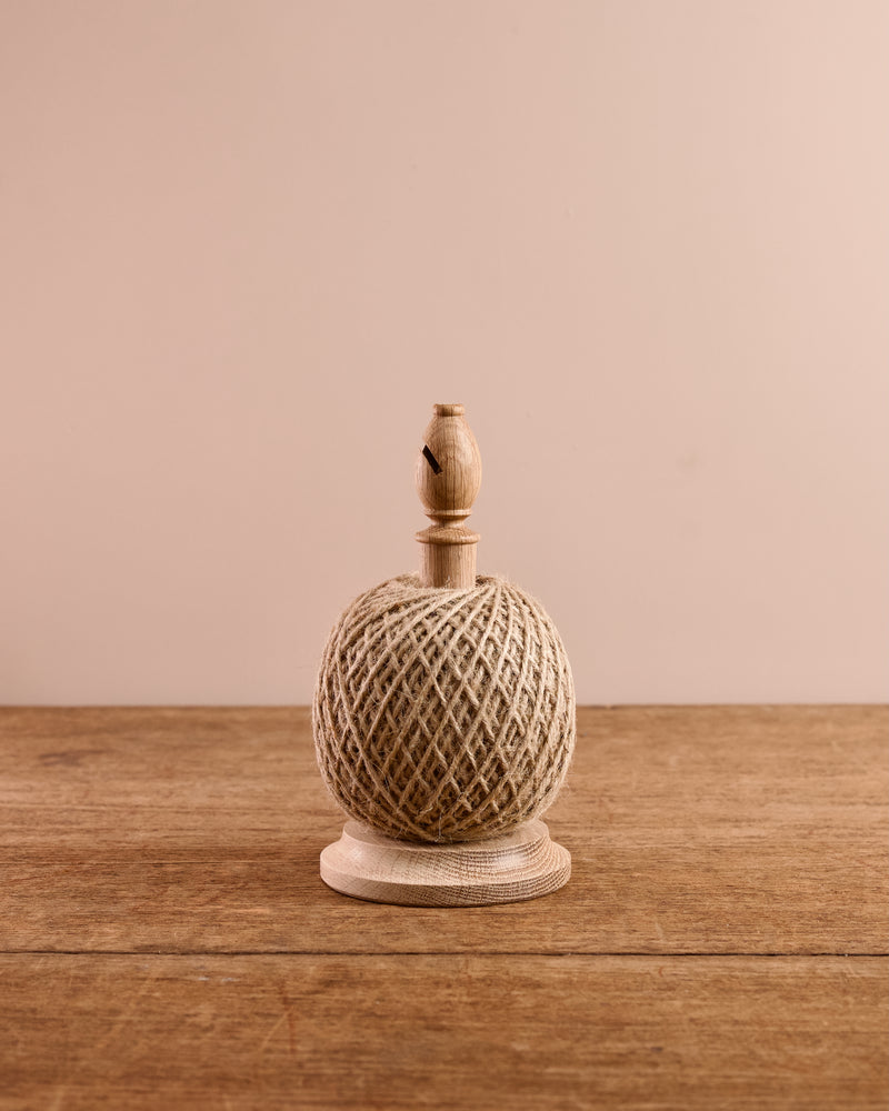 Garden twine on an oak base